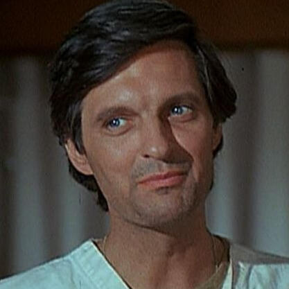 Collage consisting of different stationary elements on brown paper, including a red paper clip, a sticker of a bird silhouette, tape, and scissors. On it is the title of the zine: "Confidential: The Neil Josten Experience (Definitely Not Mafia Secreits).